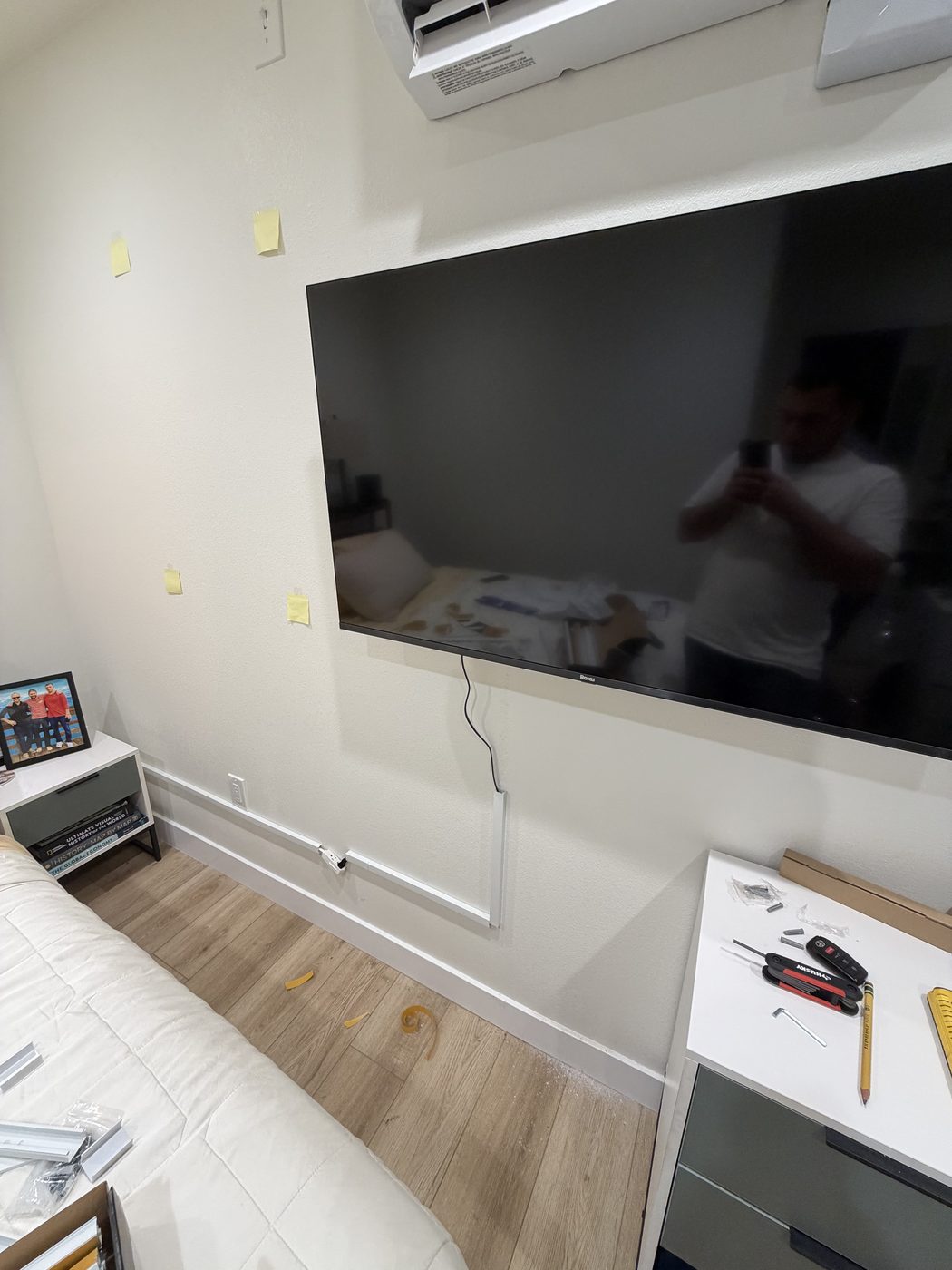 Wall-mounted TV