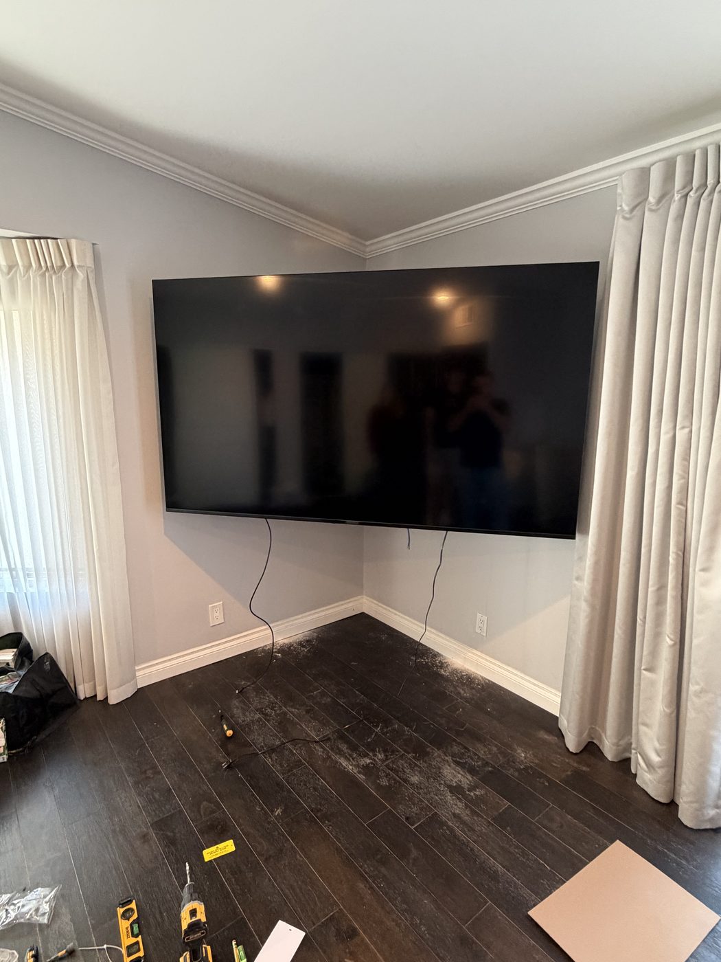 Large wall-mounted TV
